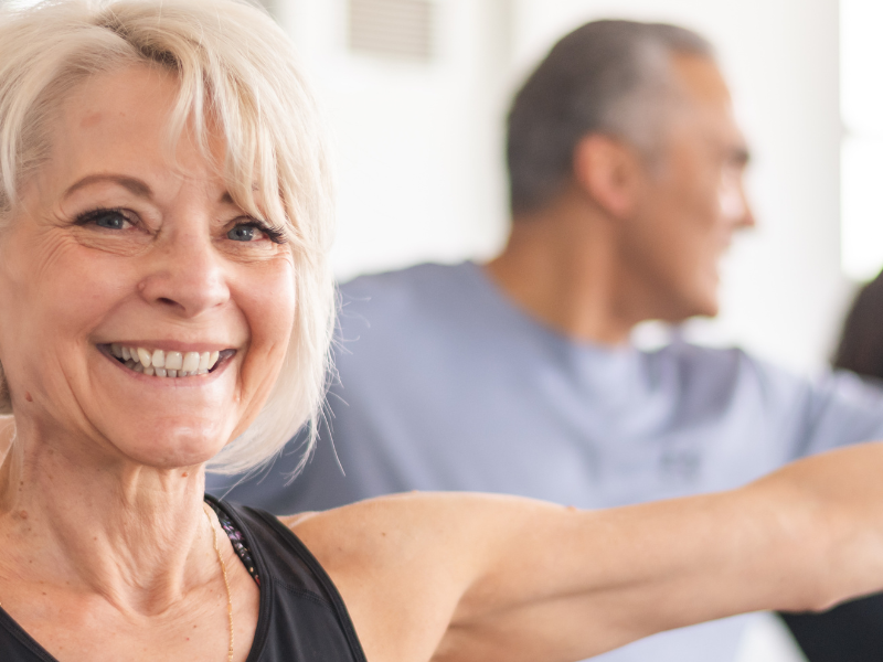 woman in group yoga class